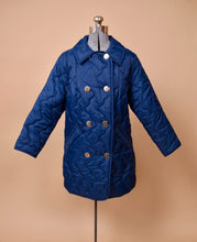 Load image into Gallery viewer, Vintage navy blue quilted long coat is shown from the front. This jacket is made from a quilted puffy material.
