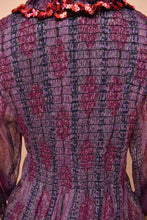 Load image into Gallery viewer, The back of the dress is visible up close.
