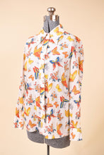 Load image into Gallery viewer, 1970&#39;s butterfly shirt is shown from the side. The shirt is multicolored.
