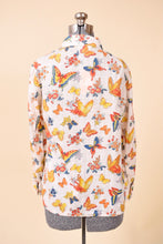 Load image into Gallery viewer, 1970s butterfly shirt is shown from the back. The shirt has long sleeves.

