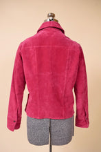 Load image into Gallery viewer, Pink suede jacket is shown from the back. The jacket has a collar.
