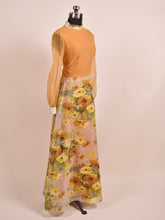 Load image into Gallery viewer, Golden Floral Goddess 70s Maxi Dress as shown from the side
