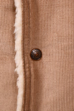Load image into Gallery viewer, Tan corduroy Levi&#39;s vest snap is shown up close. This snap has the Levi&#39;s branding.

