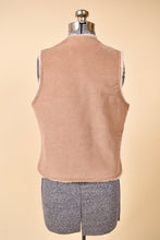 Load image into Gallery viewer, Tan corduroy Levi&#39;s vest is shown from the back. This vest is from the 1970&#39;s.
