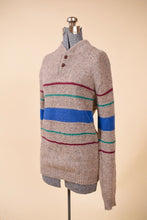 Load image into Gallery viewer, Beige sweater is shown from the side. The sweater has a curved standup collar.
