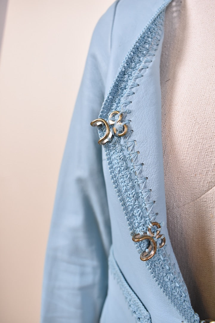 Vintage Y2K Genuine Leather Lace Trim Cropped Jacket shown from clasp detail