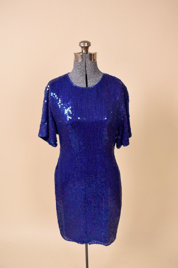 80s blue sequin dress shown from the front