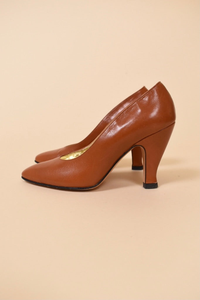 Brown Leather Pumps by Escada are shown from the side