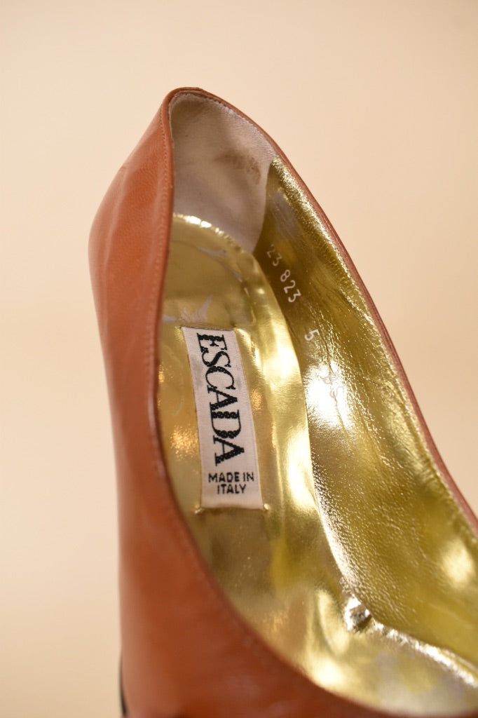 Brown Leather Pumps by Escada are shown from the inner lining
