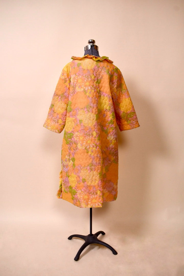 50s/60s Orange, Pink, and Yellow floral long bed jacket from the back
