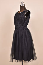 Load image into Gallery viewer, 1950s black party dress shown from the side
