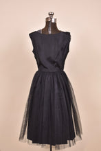 Load image into Gallery viewer, 1950s black party dress shown from the back
