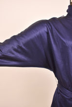 Load image into Gallery viewer, Close up of dolman sleeve on Navy Turtleneck &amp; Sequin Skirt set
