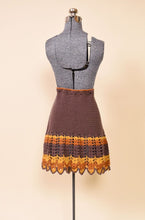 Load image into Gallery viewer, Brown, Orange, and Yellow Crochet Tie Waist Skirt: Shown from Back
