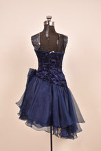 Load image into Gallery viewer, 80s Strappy organza and velvet cocktail dress with big bow shown from the back
