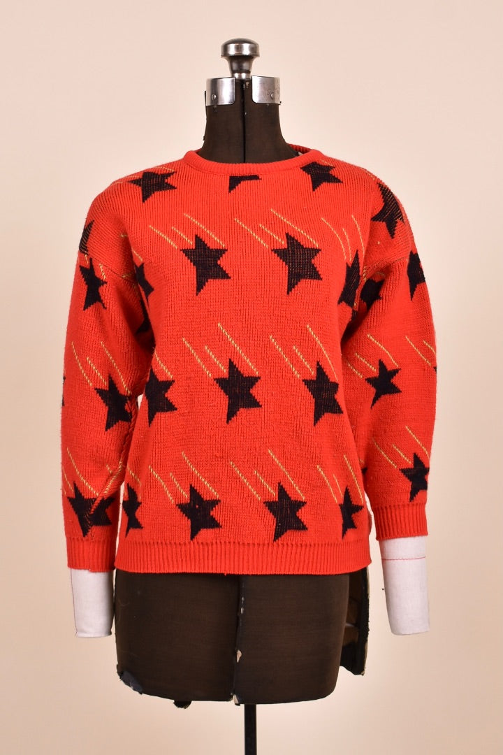 Red Shooting Star Print Sweater as shown from the front