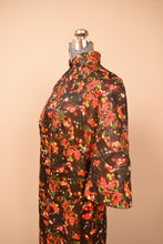 Load image into Gallery viewer, Psychedelic christmas floral maxi dress shown closeup from the side to highlight the bell sleeve
