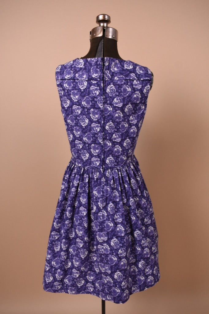 Purple Rose Print 80s Cotton Dress By Laura Ashley is shown from the back full length