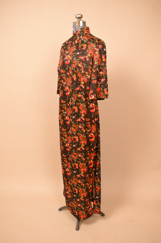 Psychedelic christmas floral maxi dress shown at 45 degree angle