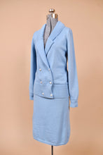 Load image into Gallery viewer, Vintage baby blue wool set by Lilly Ann Knits is shown from the side. This 70s two piece sweater set has a midi length pencil skirt. 

