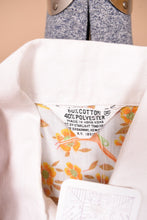 Load image into Gallery viewer, Vintage sixties white and orange bird print top is shown in close up. This top is made in Hong Kong.
