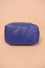 Load image into Gallery viewer, Vintage Y2K Coach Carrie handbag is shown from the bottom.
