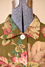 Load image into Gallery viewer, Vintage olive green 90&#39;s botanical print shirt jacket by Outside Designworks is shown in close up. This jacket has a green and pink botanical print. 
