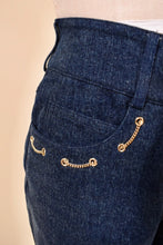 Load image into Gallery viewer, Vintage late 90&#39;s Saint John designer jeans are shown in close up. These navy denim stretch jeans have front hip pockets. 
