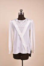 Load image into Gallery viewer, Vintage white lace cutout blouse by Lamexi is shown from the front. 

