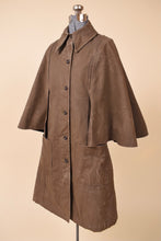 Load image into Gallery viewer, Vintage 60&#39;s olive waxed canvas cape sleeve jacket is shown from the side. This jacket has two hip pockets. 

