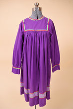 Load image into Gallery viewer, Vintage 1970s purple cotton tunic dress by Karavan is shown from the front. This dress has long sleeves.
