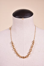 Load image into Gallery viewer, Vintage gold plated chain link necklace is shown from the front.

