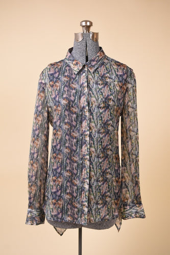 Vintage sheer Theyskens' Theory patterned blouse is shown from the front. 