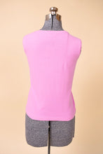 Load image into Gallery viewer, Vintage pastel pink simple nineties tank top is shown form the back. 

