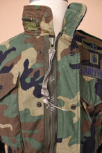 Load image into Gallery viewer, The zipper flap is folded aside so the inner zipper is visible.

