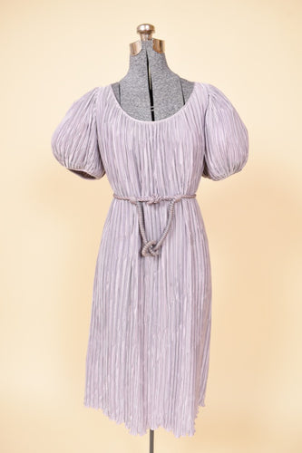 Vintage 1980's lilac purple Pierre Labiche micropleat puff sleeve dress is shown from the front. This dress has a rope belt that ties around the waist. 