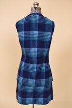 Load image into Gallery viewer, Vintage seventies monochrome blue plaid vest and skirt set is shown from the back. This set has a mini skirt and vest. 
