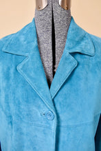 Load image into Gallery viewer, Vintage turquoise blue suede blazer is shown in close up. This colorful suede jacket has a lapel. 
