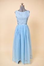 Load image into Gallery viewer, Vintage powder blue handmade princess maxi gown is shown from the front. This dress has a brocade floral print bodice. 
