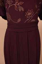 Load image into Gallery viewer, Vintage nineties deep wine red maxi dress is shown in close up. This dress has a belt at the waist.
