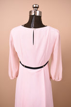Load image into Gallery viewer, Ted Baker London light pink babydoll mini dress is shown in close up. This dress has a keyhole at the back of the neckline.
