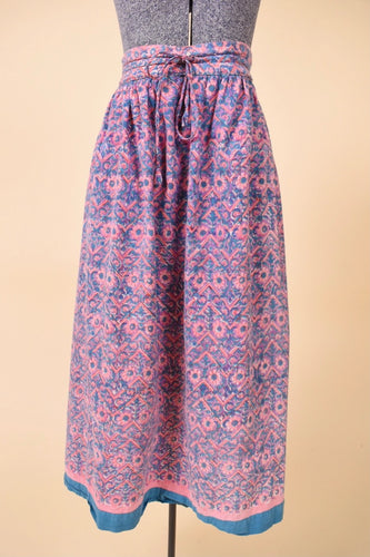 Vintage purple and blue block print skirt by Anokhi is shown from the front. This skirt cinches with a bow at the waist. 