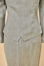Load image into Gallery viewer, Vintage 1990&#39;s two piece seafoam green power suit is shown from the back. This set is a heather green material.
