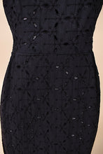 Load image into Gallery viewer, Vintage fifties eyelet cotton dress by Puritan is shown in close up. 
