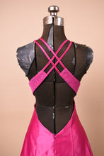 Load image into Gallery viewer, Vintage open back dress is shown from the back close up. The dress has thin straps.

