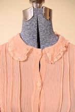 Load image into Gallery viewer, Vintage textured silk crepe frilly collared button down top is shown in close up. This top has a collar with lace trim. 
