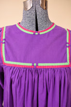 Load image into Gallery viewer, Vintage 70&#39;s purple midi length tunic dress is shown in close up. This dress has hot green and hot pink trim.
