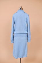 Load image into Gallery viewer, Vintage 70&#39;s baby blue wool set is shown from the back. This set has a cardigan sweater and midi length skirt. 
