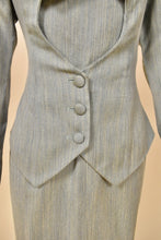 Load image into Gallery viewer, Vintage 90s seafoam green blazer is shown in close up. This cutout blazer has three buttons at the waist. 
