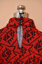 Load image into Gallery viewer, Vintage 80s black and red knit dress by Pea Patch is shown in close up. This dress has a sexy keyhole at the back.
